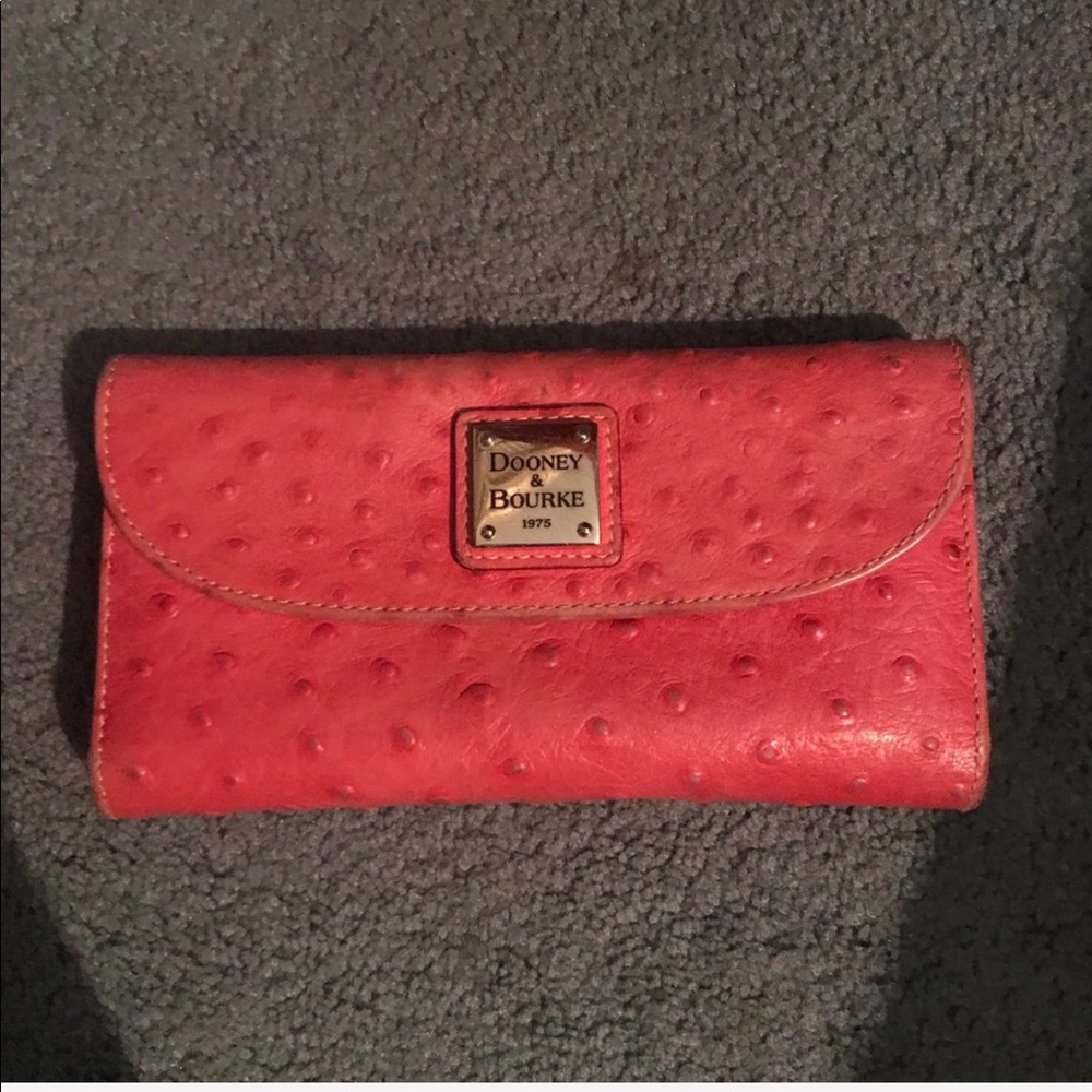 Authentic pink dooney ostrich wallet! Wallet only
